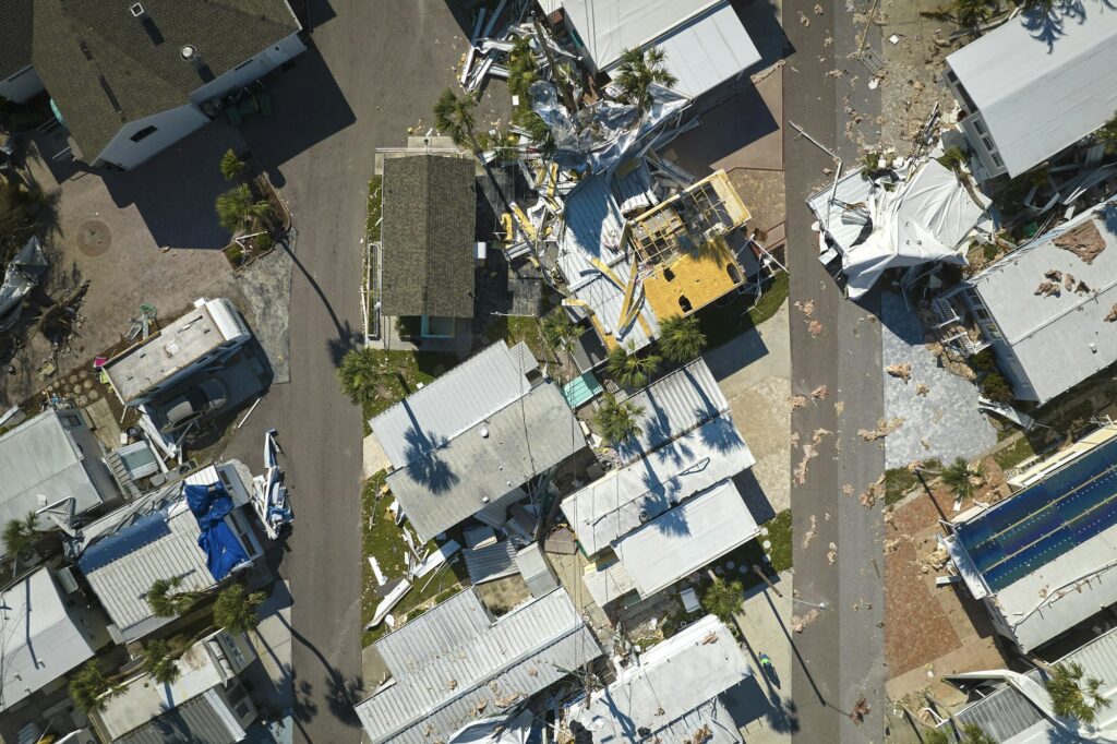 Destroyed by hurricane Ian suburban houses in Florida mobile home residential area.